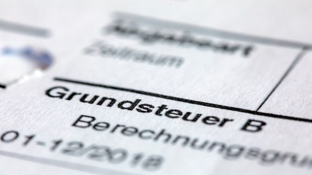 Ein Abgabenbescheid für die Entrichtung der Grundsteuer.
