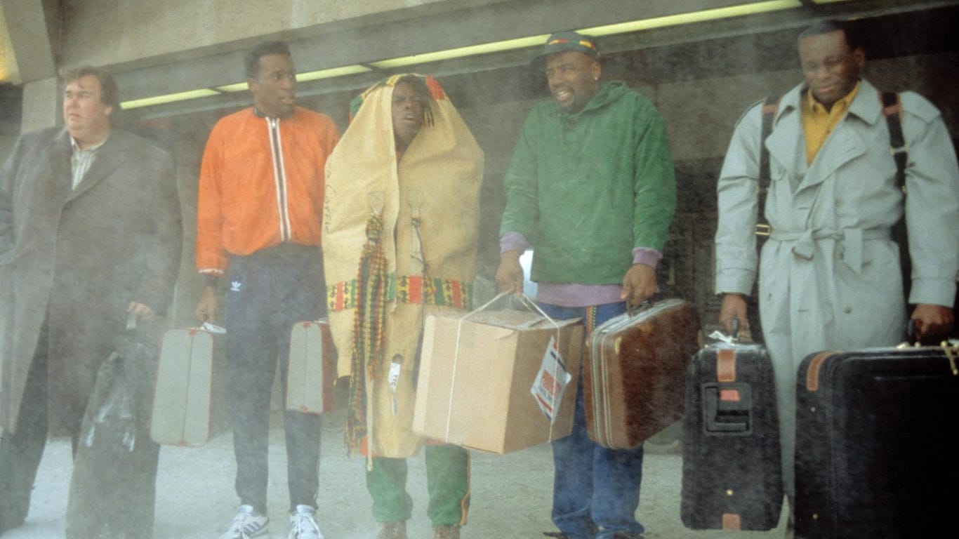 Das jamaikanische Bobteam bei der Ankunft in Calgary im Film "Cool Runnings".