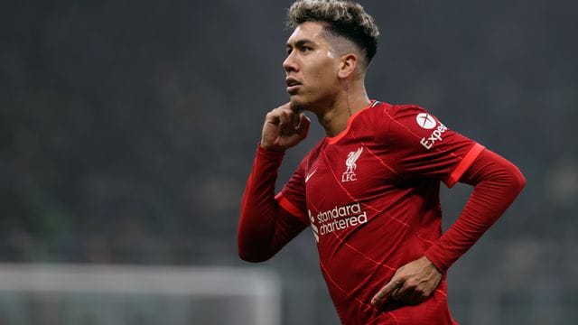 Firmino vom FC Liverpool jubelt über sein Tor zur 1:0-Führung bei Inter Mailand. Firmino vom FC Liverpool jubelt über sein Tor zur 1:0-Führung bei Inter Mailand.