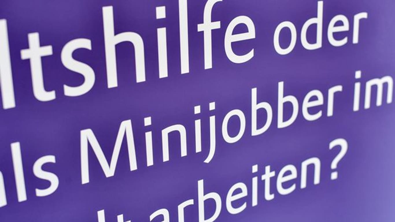 Das Wort "Minijobber" ist auf einem Plakat zu lesen