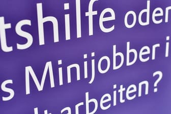 Das Wort "Minijobber" ist auf einem Plakat zu lesen