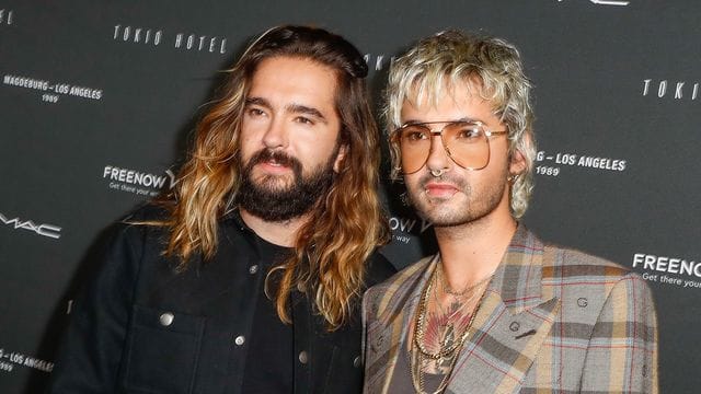 Verschieben ihre internationale Tournee: Tom Kaulitz (l) und sein Bruder Bill Kaulitz.