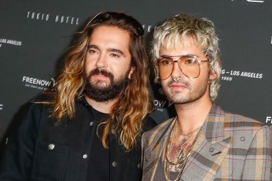 Verschieben ihre internationale Tournee: Tom Kaulitz (l) und sein Bruder Bill Kaulitz.