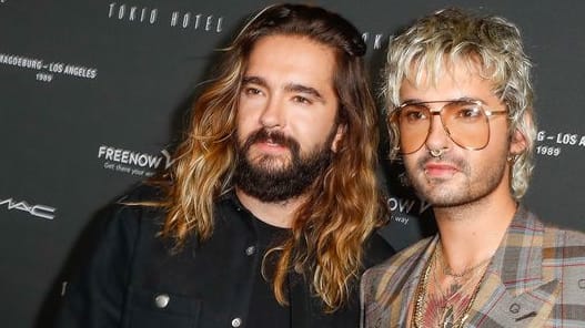 Verschieben ihre internationale Tournee: Tom Kaulitz (l) und sein Bruder Bill Kaulitz.