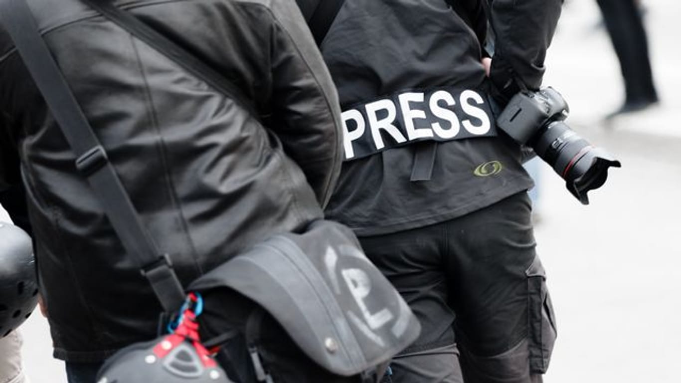 Reporter bei Protest