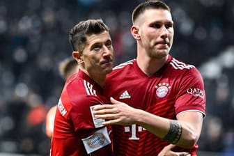 Robert Lewandowksi (li.) und Niklas Süle: Noch ist unsicher, ob die beiden Bayern-Profis am Samstag gegen Union Berlin auflaufen können.