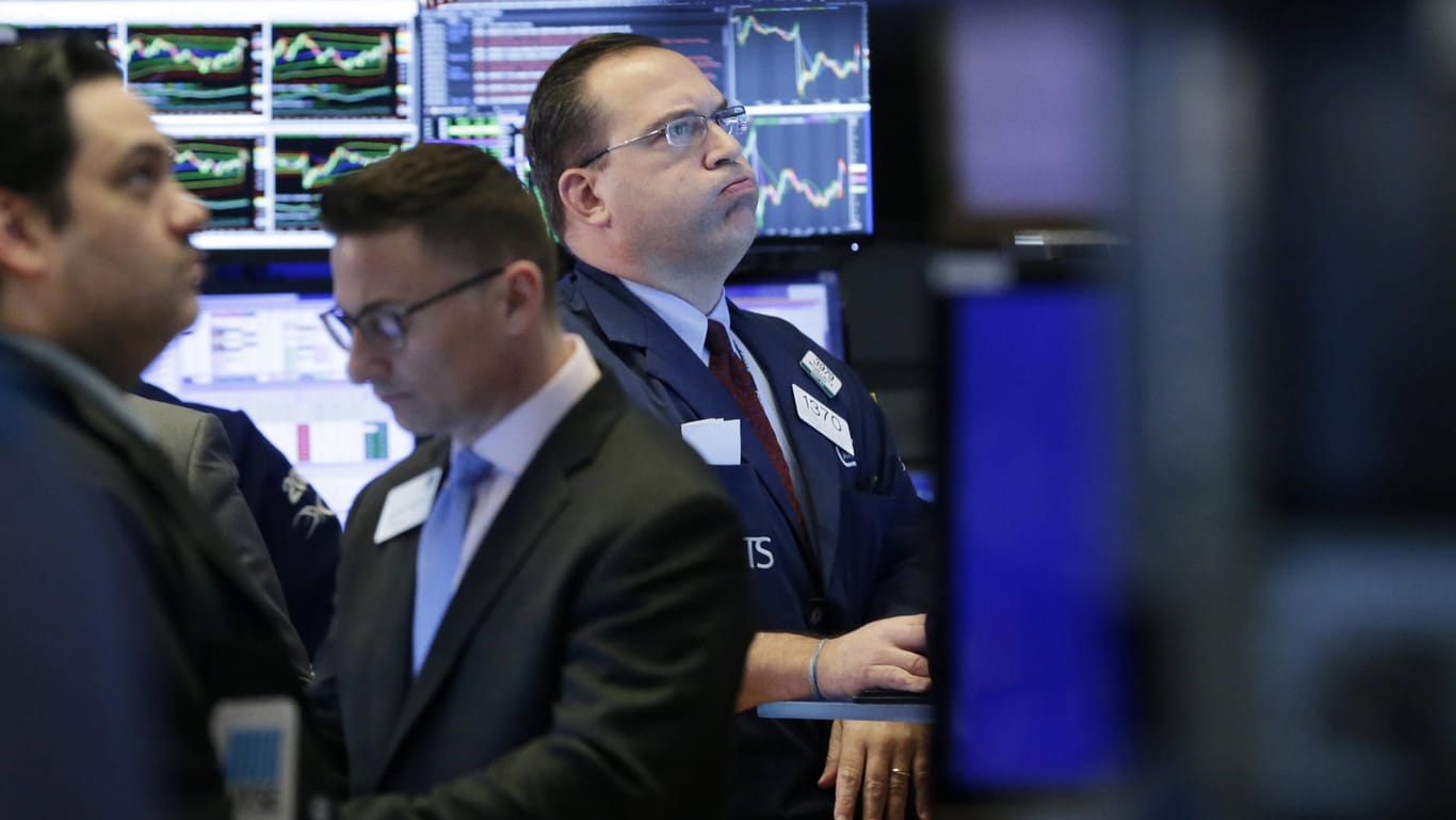 Händler an der New Yorker Wall Street: Die US-Börse schließt im Plus.