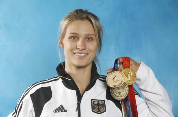 Wenige Monate später konnte sie alle drei Goldmedaillen - Olympia, WM und EM - präsentieren.