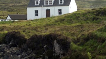 Ein einsames Cottage auf der Isle of Skye.