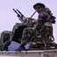 Libysche Rebellen rücken westwärts auf die Stadt Brega vor. Ein aufziehender Sandsturm verdunkelt den Himmel. Libysche Rebellen rücken westwärts auf die Stadt Brega vor. Ein aufziehender Sandsturm verdunkelt den Himmel.