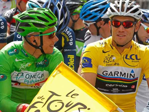 Bei Omega Pharma-Lotto-Fahrer Philippe Gilbert in Grün und Garmin-Profi Thor Hushovd in Gelb herrscht vor dem Start gute Laune.