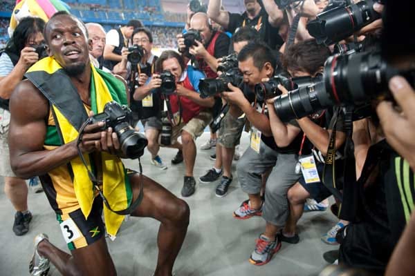 Rollentausch: Sprint-Superstar Usain Bolt versucht sich als Paparazzo.