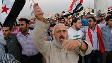 In Jordanien lebende Syrer demonstrieren gegen den syrischen Präsidenten Assad