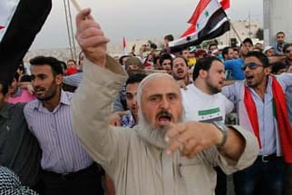 In Jordanien lebende Syrer demonstrieren gegen den syrischen Präsidenten Assad