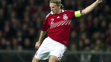 Christian Poulsen schickt mit Dänemark am letzten Spieltag die favorisierten Portugiesen in die Relegation und qualifiziert sich direkt für die EM 2012.