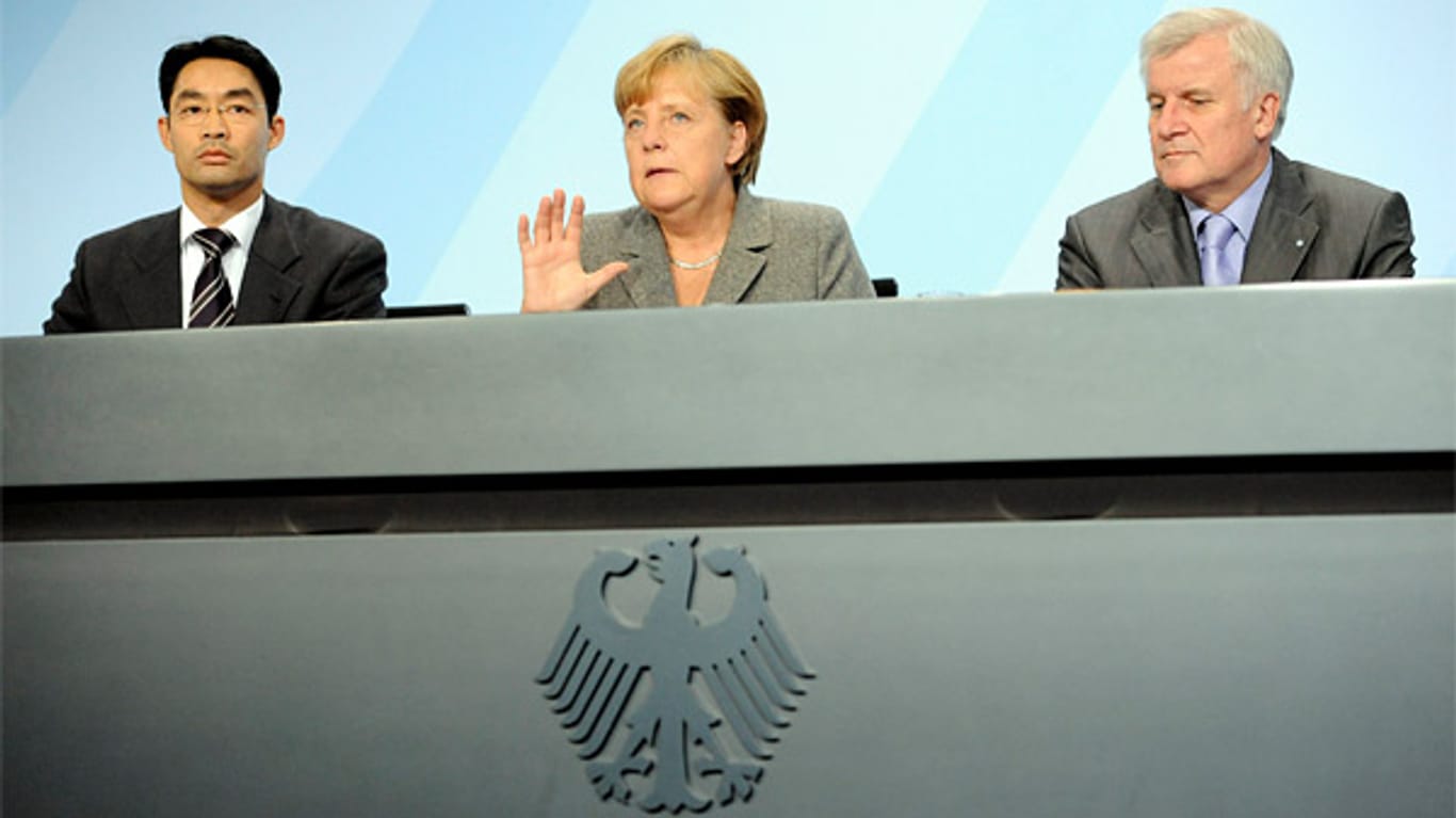 Merkel, Rösler und Seehofer sind sich einig: Steuersenkungen sollen kommen