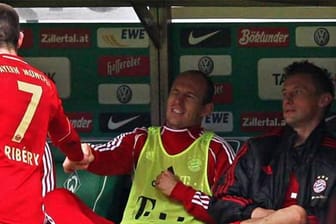 Hand- statt Faustschlag: Franck Ribéry und Arjen Robben klatschen sich ab.