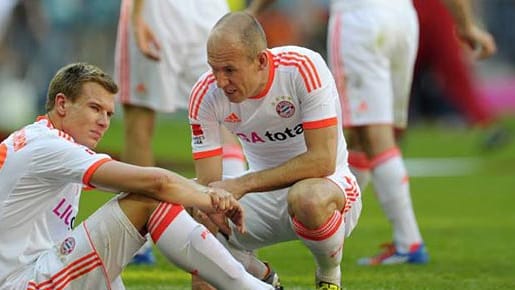 Holger Badstuber und Arjen Robben müssen auf die große Bayern-Party noch warten. Holger Badstuber und Arjen Robben müssen auf die große Bayern-Party noch warten.