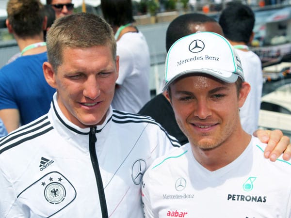 Bastian Schweinsteiger (li.) und Nico Rosberg
