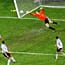 Der Moment des Schocks: Fabio Grosso fällt der Ball vor die Füße, er nimmt Maß und schlenzt ihn unhaltbar für Jens Lehmann ins lange Eck.