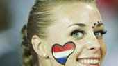 Diese Holländerin trägt ihr Herz nicht auf der Zunge, dafür aber auf der Backe.
