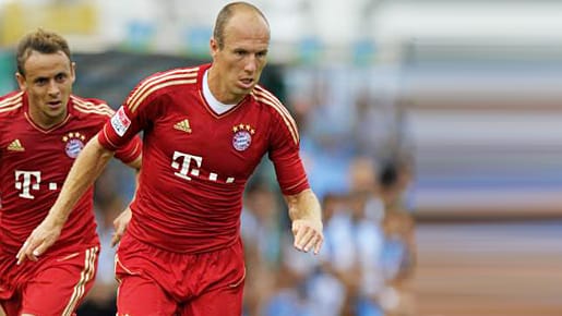 Werbeträger in Aktion: Die Münchner Rafinha (li.) und Arjen Robben.
