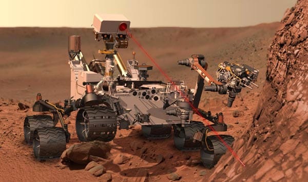 Die Animation zeigt "Curiosity" bei Arbeit mit einem Laserstrahl von acht Metern Reichweite. Seine Mission gilt der Suche nach Wasser und Lebensspuren.