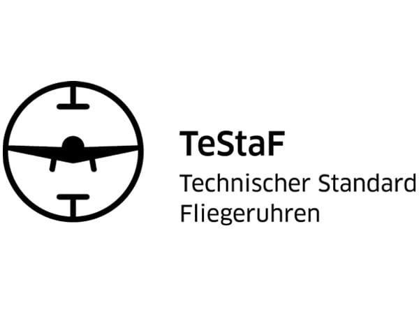 Das TeStaF-Logo: Uhren mit einem TeStaF-Zertifikat dürfen sich mit dem entsprechenden Logo schmücken. Dies wurde einem künstlichen Horizont aus dem Cockpit eines Flugzeuges entlehnt, es zeigt eine stilisierte Flugzeug-Silhouette von vorne - wenn auch ohne Leitwerk.