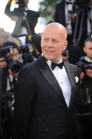 Manche Prominente haben die Glatze zu ihrem Stilmerkmal gemacht und sind, wie Bruce Willis, unverwechselbar geworden.