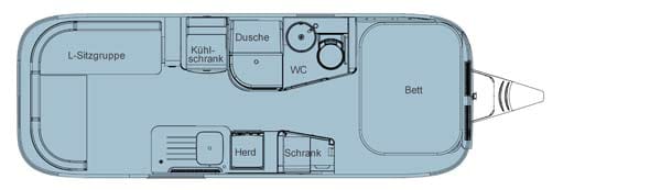 Im Innenraum bietet der Airstream 604 ein großes Doppelbett im Bug und eine L-Sitzgruppe im Heck.