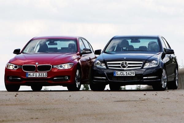 Harte Konkurrenten in der Mittelklasse: BMW 3er (im Bild links) und Mercedes C-Klasse