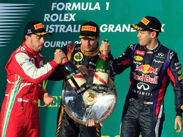 Zu dem Finnen (Mi.) gesellen sich Fernando Alonso (li.) und Sebastian Vettel auf das Podium.