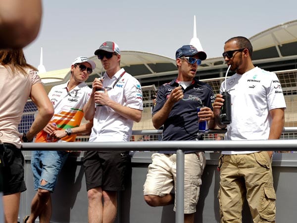 Adrian Sutil, Nico Hülkenberg, Sebastian Vettel und Lewis Hamilton (v.li.n.re.) bei der Fahrerparade.