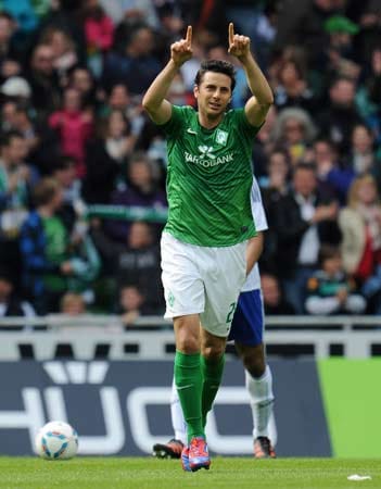 Claudio Pizarro wechselte 2001 und 2012 von Werder Bremen nach München.