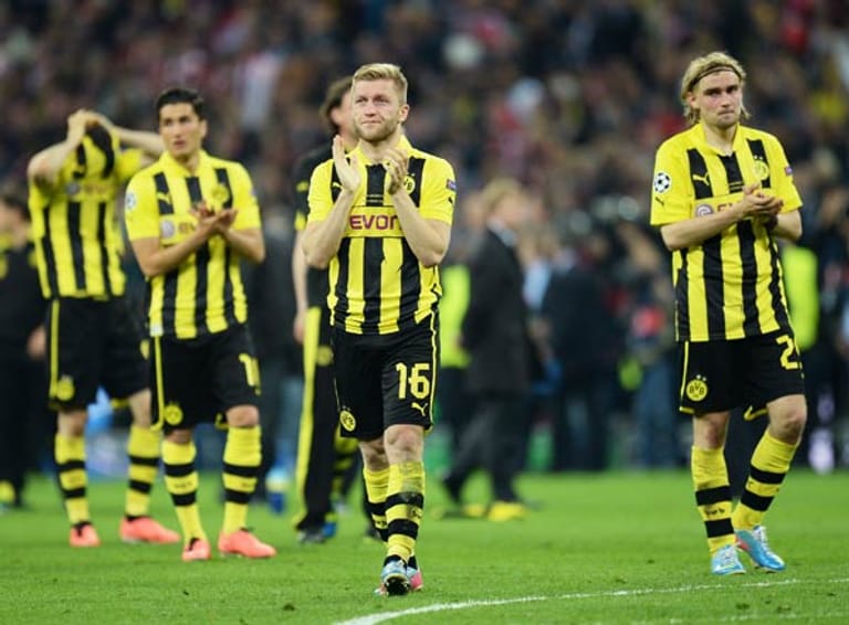 Faire Verlierer: Enttäuschte Dortmunder nach einem grandiosen Endspiel.