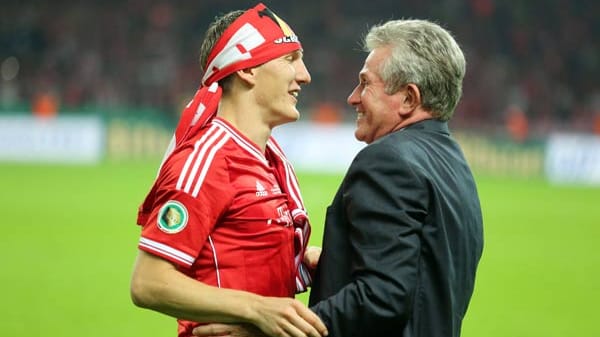 Der Chef und sein Leader: Jupp Heynckes und Bastian Schweinsteiger genießen ihren historischen Erfolg.