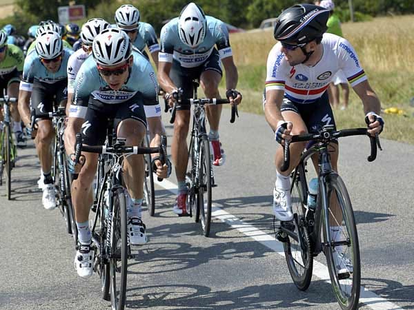 Auf Platz fünf: Vier Etappensiege gab es für das Team Omega Pharma-Quick Step bei der Tour. Tony Martin (links) war im Zeitfahren erfolgreich, Mark Cavendish (rechts) zweimal im Sprint. Auch Matteo Trentin ließ die Mannschaft jubeln, die 121.260 Euro verdiente.
