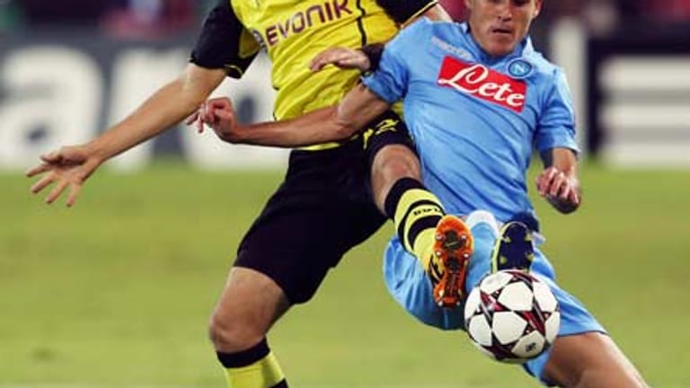 Borussia Dortmund startet in Neapel in die Champions-League-Saison 2013/14. Vor 58.000 Zuschauern im Stadio San Paolo strahlt der Tabellenführer der Serie A zunächst kaum Torgefahr aus.