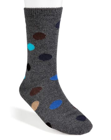 Mit diesen gepunkteten Socken können Sie Ihren Look leicht auflockern und so den Dandy-Style ausprobieren. Socken von Paul Smith, für etwa 30 Euro.