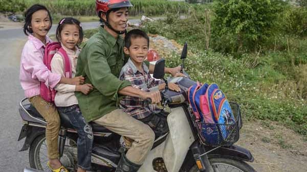 Familientaxi in Hanoi, Vietnam.