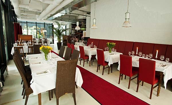 Loft-Charakter im Erdgeschoss: Das Restaurant "La Mano Verde" setzt auf urbanen Chic. Loft-Charakter im Erdgeschoss: Das Restaurant "La Mano Verde" setzt auf urbanen Chic.