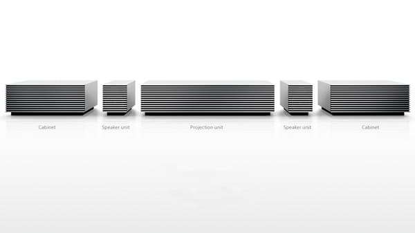 In dem kommodenartigen Gehäuse des Sony 4K Ultra Short Throw Projectors stecken neben dem eigentlichen Beamer in der Mitte auch Lautsprecher und zwei Staufächer. In dem kommodenartigen Gehäuse des Sony 4K Ultra Short Throw Projectors stecken neben dem eigentlichen Beamer in der Mitte auch Lautsprecher und zwei Staufächer.