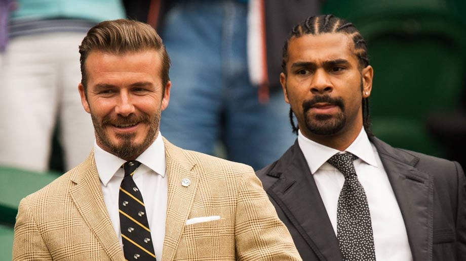 Wimbledon lockt immer wieder auch andere Profisportler und Prominente an. Wie hier den ehemaligen Fußballprofi David Beckham (li.) und den Ex-Profiboxer David Haye.
