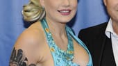 Bei der Verleihung des Deutschen Comedypreises präsentierte Melanie Müller ihr großes, neues Oberarm-Tattoo: Auf der einen Seite prangt ein gruseliger Harlekin-Kopf, daneben die schöne Marilyn Monroe.