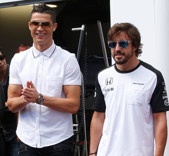 Nirgendwo besuchen so viele Prominente die Formel 1 wie in Monaco. Weltfußballer Cristiano Ronaldo (li.) schaut Fernando Alonso und McLaren vorbei.