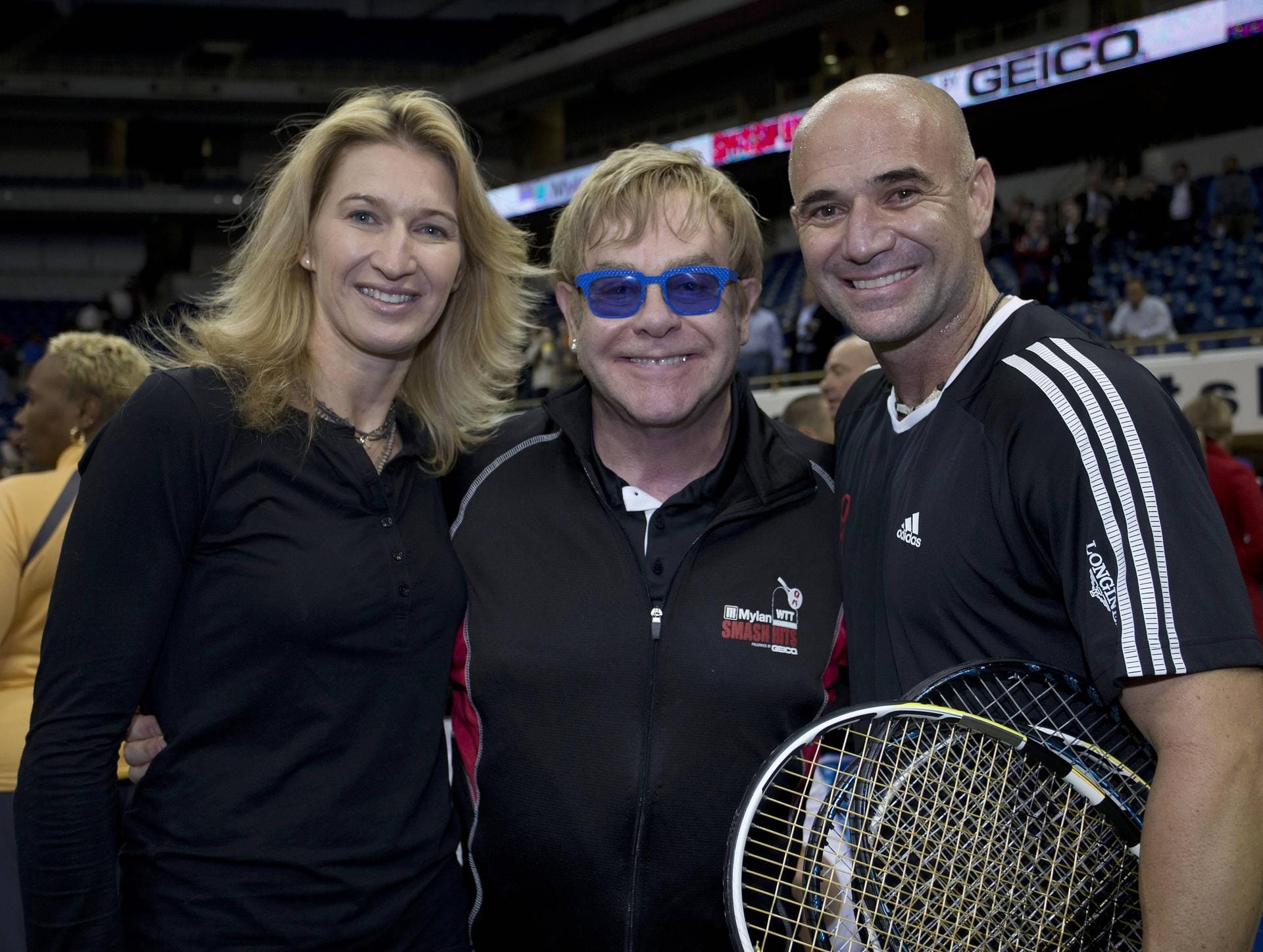 2012: Sie sind gemeinsam mit Musiker Elton John bei einem Charity-Turnier.