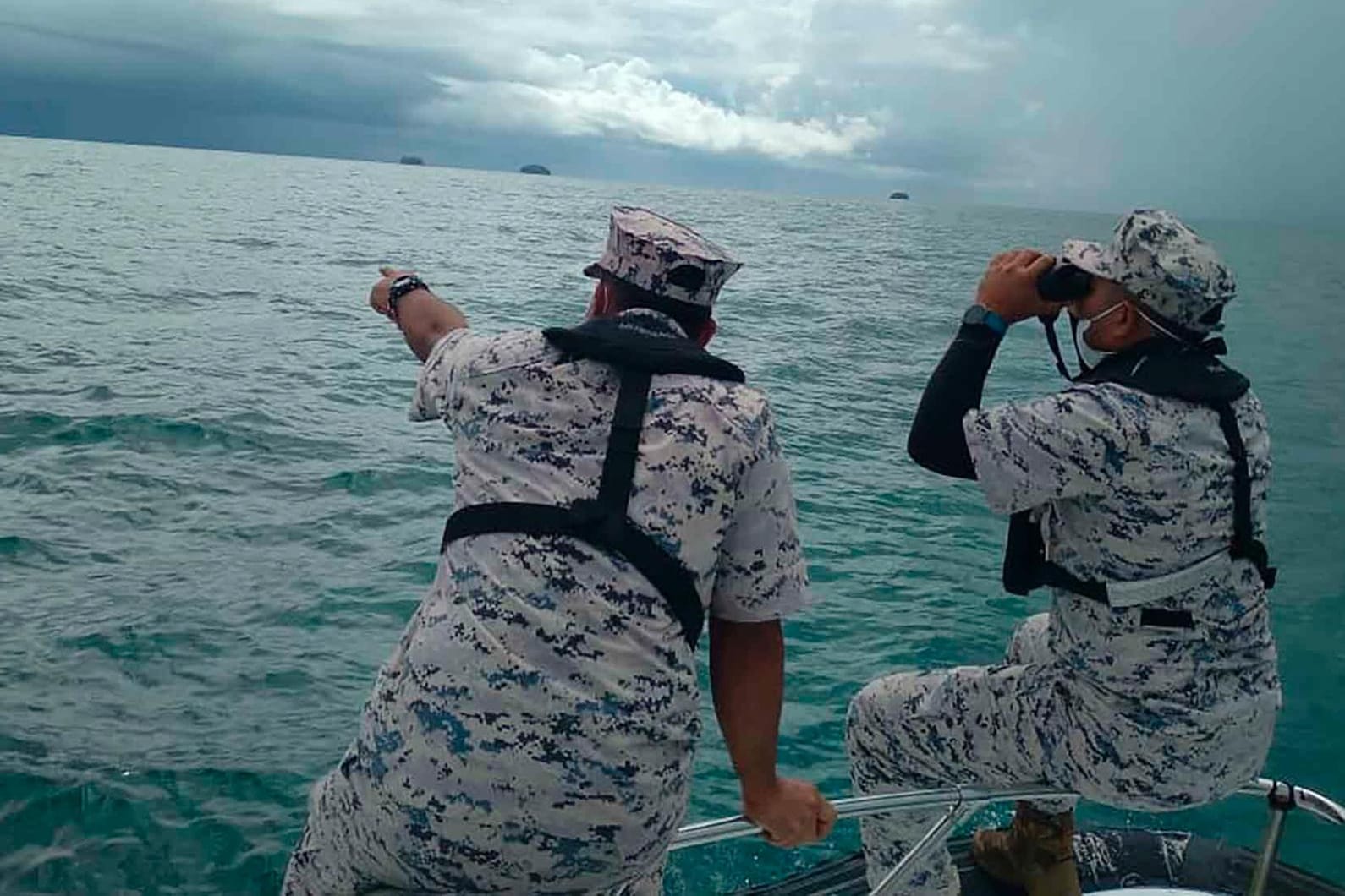 Suchtrupps vor der Küste Malaysias: Zwei vermisste europäische Taucher konnten bereits gefunden werden.