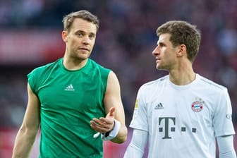 Bayerns Manuel Neuer (l) und Thomas Müller.