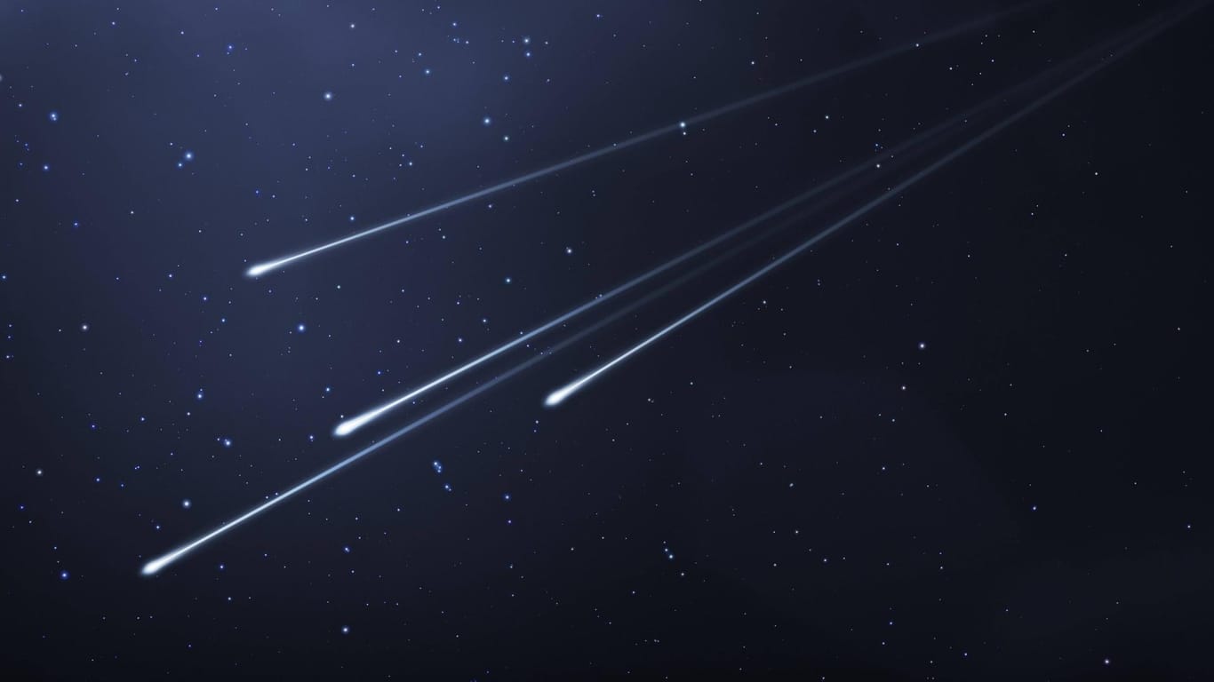Sternschnuppen am Himmel (Computergrafik): Jedes Jahr bewegt sich die Erde durch den Komentenstaub.