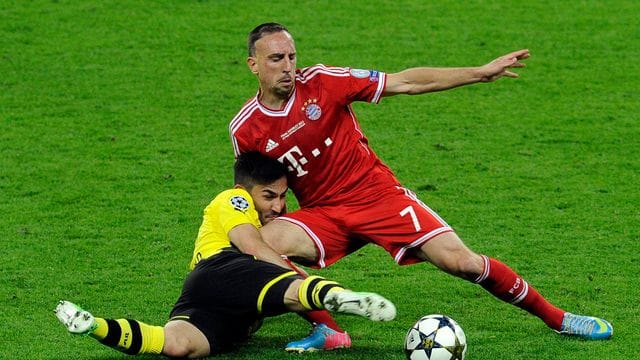 Bundesliga-Duell in London: 2013 treffen Franck Ribery (r) mit dem FC Bayern München auf Ilkay Gündogan und den BVB.